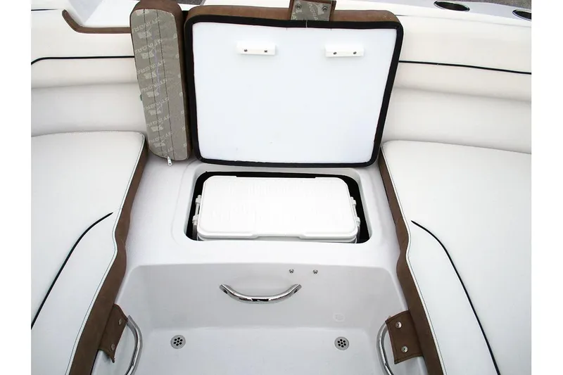 Slide: The Image of 2026 Stingray 172 DC boat interior with open storage compartment and cooler. - 18