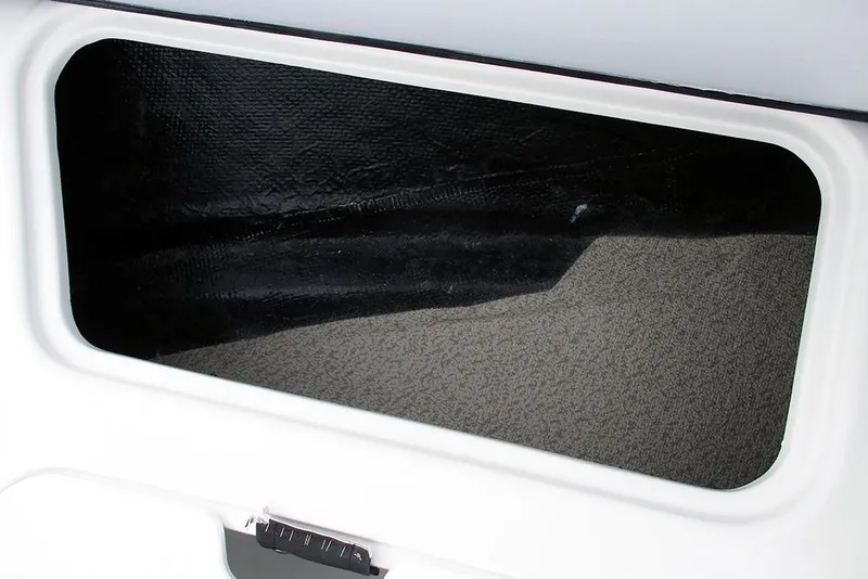 Slide: The Image of Storage compartment of 2026 Stingray 191 DC boat, featuring a sleek interior design. - 13