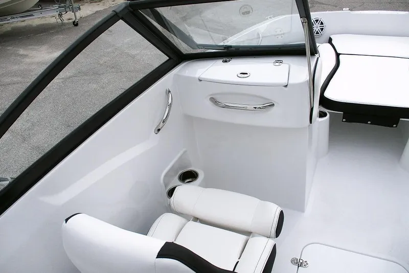 Slide: The Image of 2026 Stingray 191 DC boat interior with white seating and sleek design. - 15