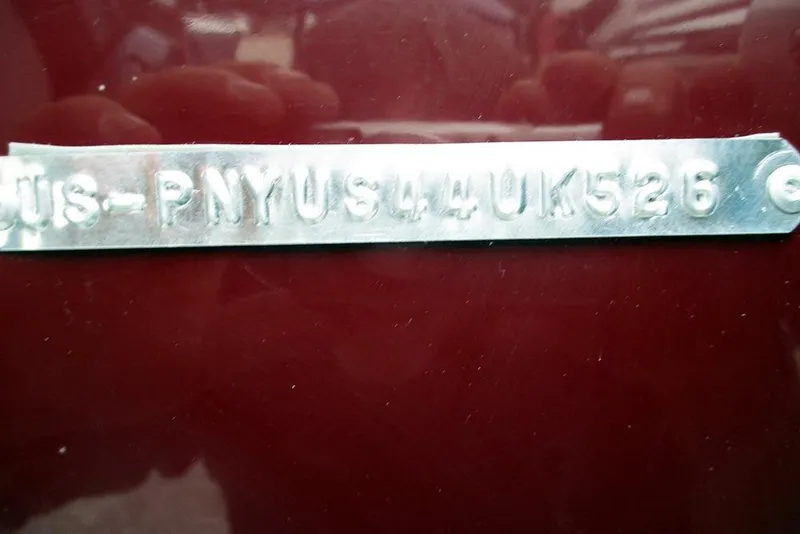 Slide: The Image of VIN plate on 2026 Stingray 191 DC boat, embossed characters on metal strip. - 21