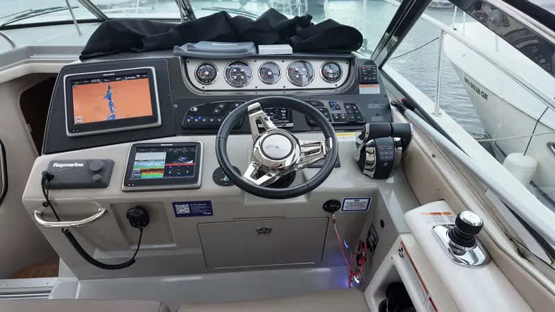 Slide: The Image of Sea Ray Sundancer 370 helm, 2016 model, featuring navigation system. - 14