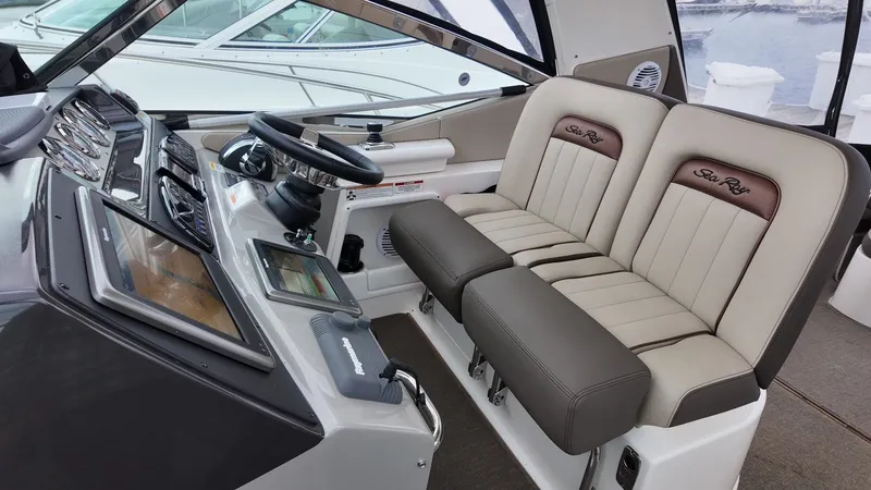 Slide: The Image of Interior of 2016 Sea Ray Sundancer 370 with helm console. - 15