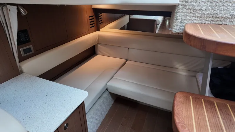Slide: The Image of Interior of 2016 Sea Ray Sundancer 370 yacht with beige sofa. - 31