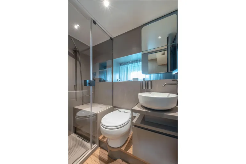 Slide: The Image of Modern bathroom interior in 2025 Bluegame BG54 yacht, featuring sleek design and fixtures. - 15