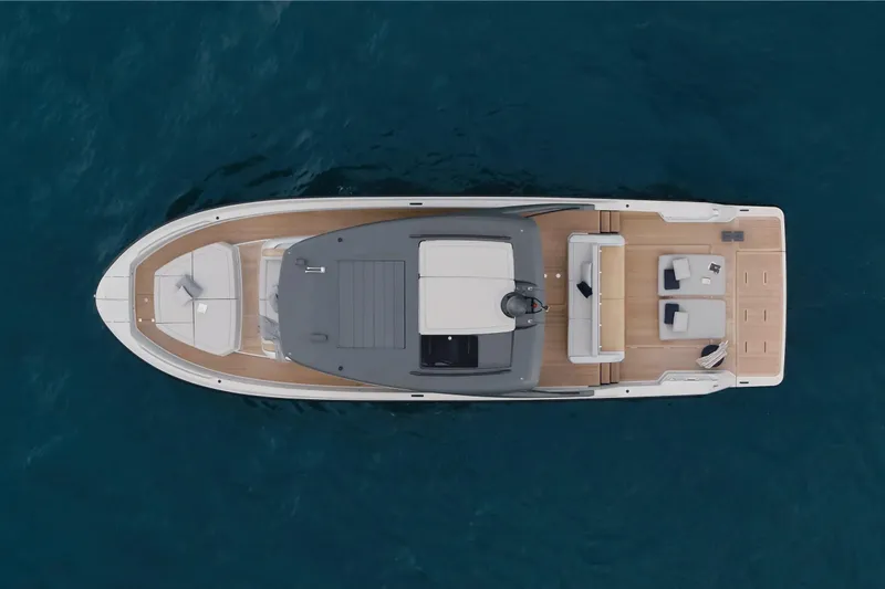 Slide: The Image of Overhead view of 2025 Bluegame BG54 yacht on open water. - 4