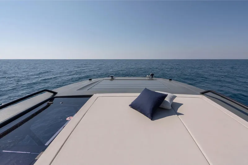Slide: The Image of Luxury deck of 2025 Bluegame BG54 yacht with ocean view and cushions. - 9