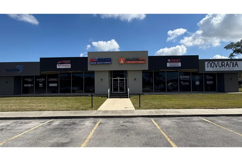 Slide: The Image of Marine sales and service storefront featuring Caribe L-8 W/ Yamaha 4, 2024 model. - 9