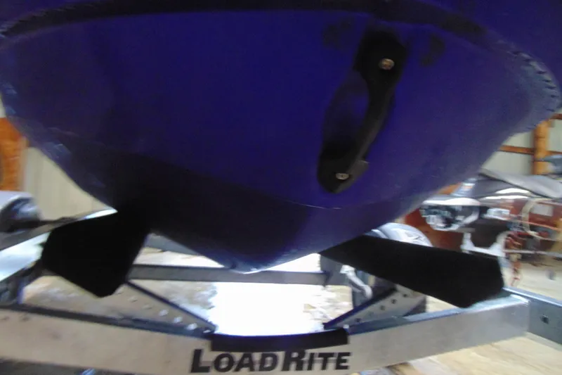 Slide: The Image of 2024 Yamaha WaveRunner JetBlaster on Load Rite trailer in a garage. - 14