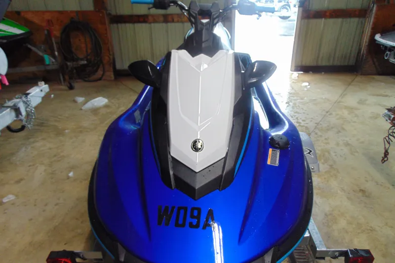 Slide: The Image of 2024 Yamaha WaveRunner JetBlaster in a garage, showcasing sleek blue design. - 4
