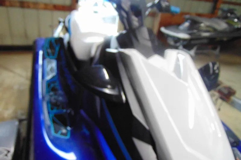 Slide: The Image of 2024 Yamaha WaveRunner JetBlaster in a garage, showcasing sleek design and vibrant colors. - 5