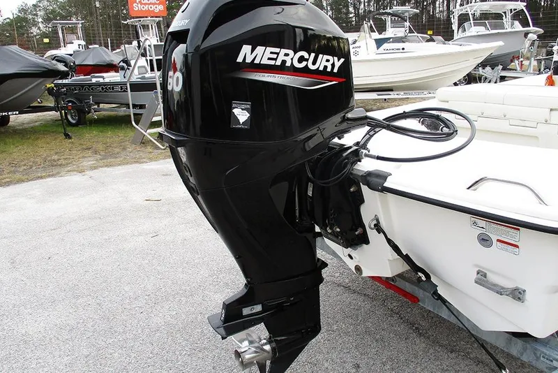 Slide: The Image of 2024 Mako Pro Skiff 15 CC with Mercury 60 outboard motor. - 9