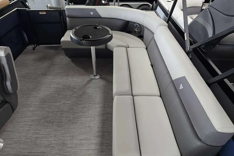 Slide: The Image of Luxurious interior of 2026 Viaggio V20C pontoon boat with plush seating and table. - 14