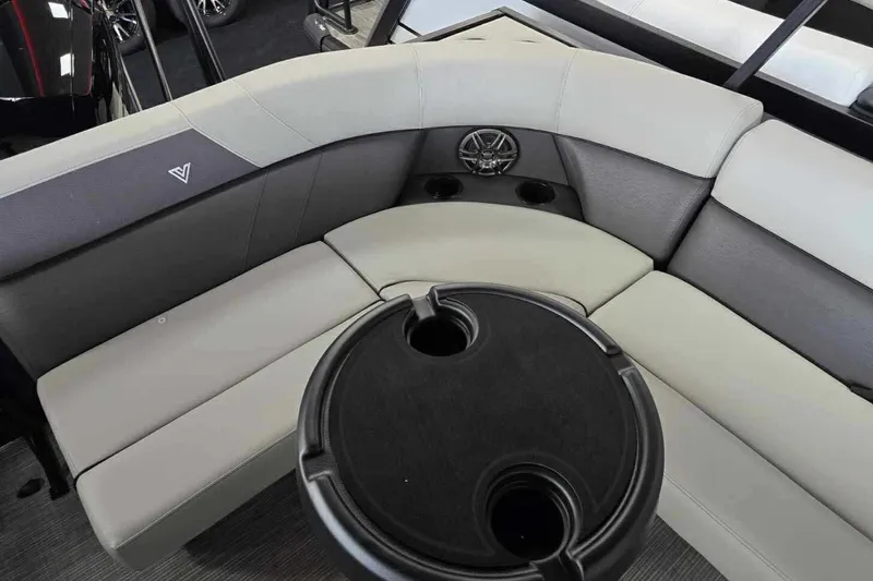 Slide: The Image of 2026 Viaggio V20C boat interior with gray seating and round table. - 19