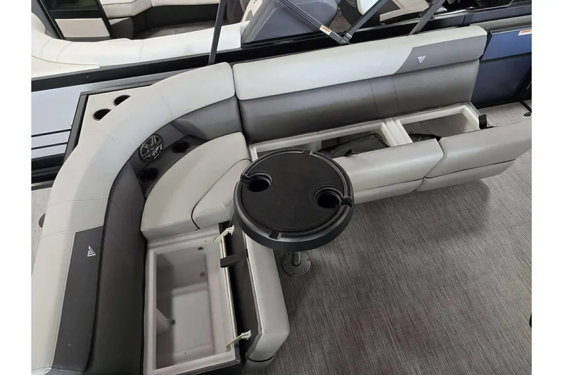 Slide: The Image of Luxurious seating area on 2026 Viaggio V20C boat with storage and cup holders. - 6