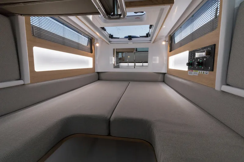 Slide: The Image of Modern sink area in 2022 Axopar 28 Cabin boat with mirror and soap dispensers. - 15