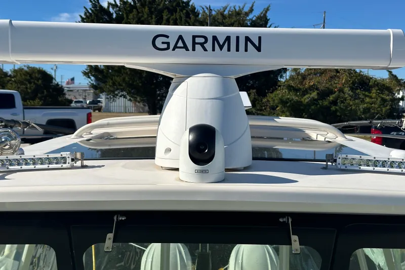 Slide: The Image of 2024 Grady-White Express 330 with Garmin radar system on deck. - 7