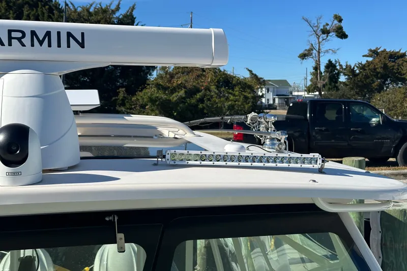 Slide: The Image of 2024 Grady-White Express 330 boat with Garmin radar and advanced equipment. - 9