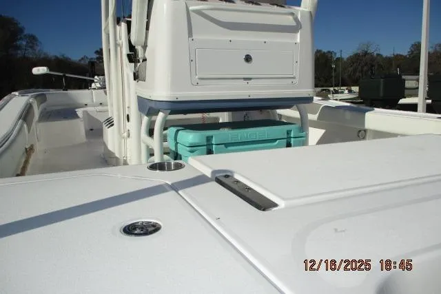 Slide: The Image of 2025 Caymas 281 HB boat deck with storage and seating area. - 11