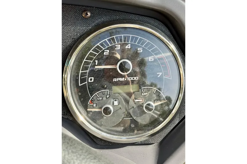 Slide: The Image of Close-up of 2022 Godfrey Sweetwater 2286 C tachometer and fuel gauge. - 10