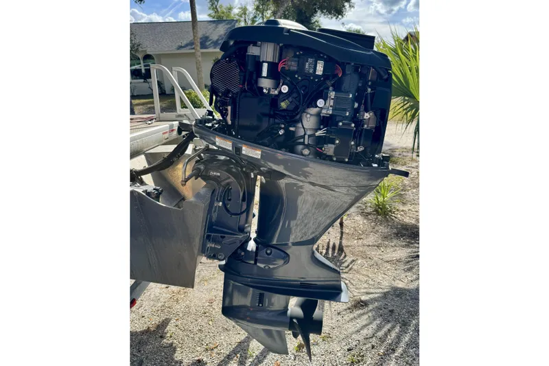 Slide: The Image of Outboard motor of 2022 Godfrey Sweetwater 2286 C pontoon boat, detailed view. - 17
