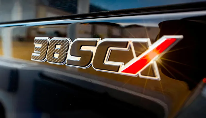 Slide: The Image of Close-up of 2025 Fountain 38 SCX logo with sleek, modern design. - 13