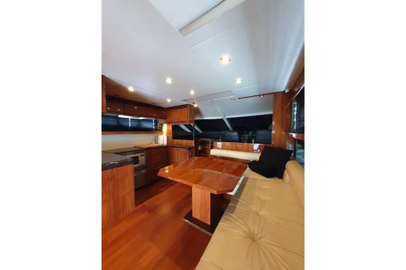Slide: The Image of Luxurious interior of 2010 Fairline Squadron 55 yacht with wooden finishes and modern amenities. - 16