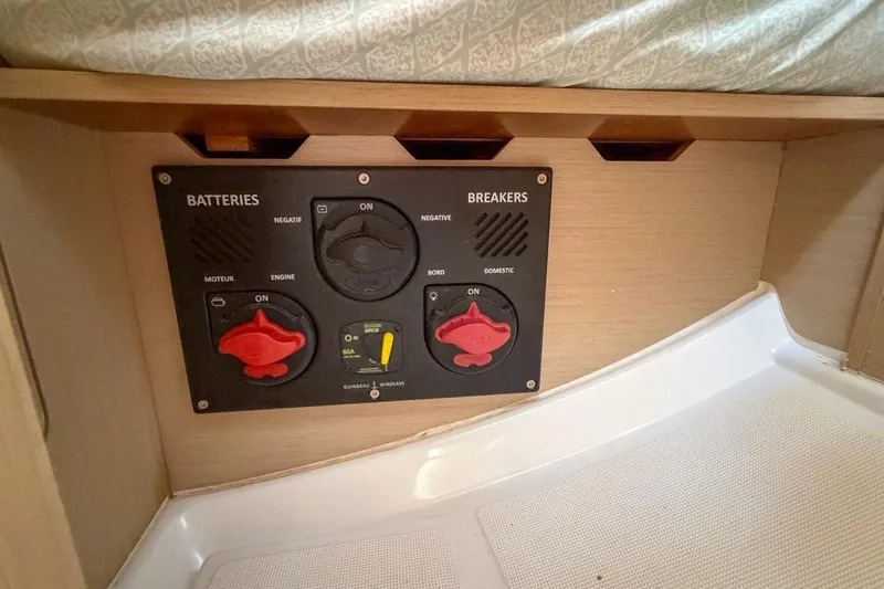 Slide: The Image of Battery and breaker panel on 2021 Beneteau Oceanis 30.1 yacht interior. - 22