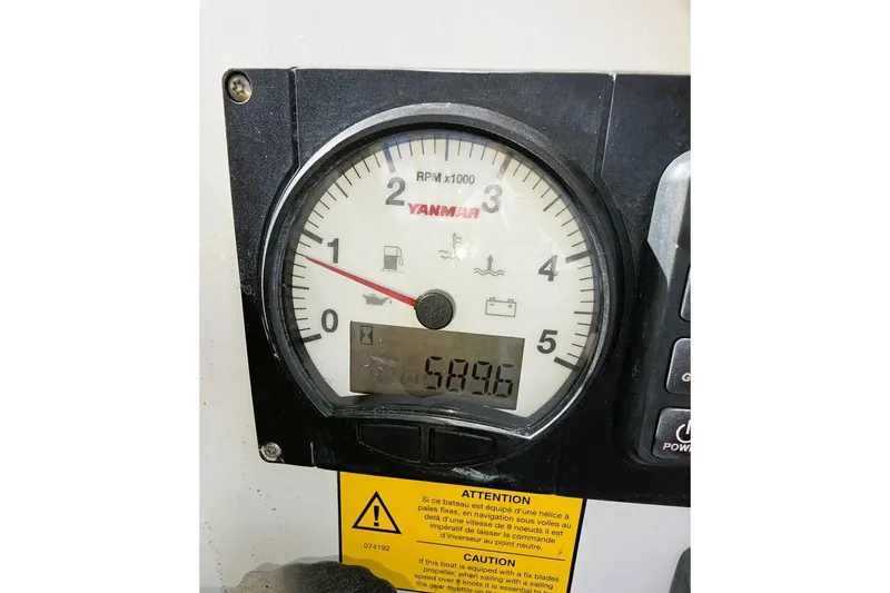 Slide: The Image of Yanmar RPM gauge on 2021 Beneteau Oceanis 30.1 sailboat dashboard. - 30