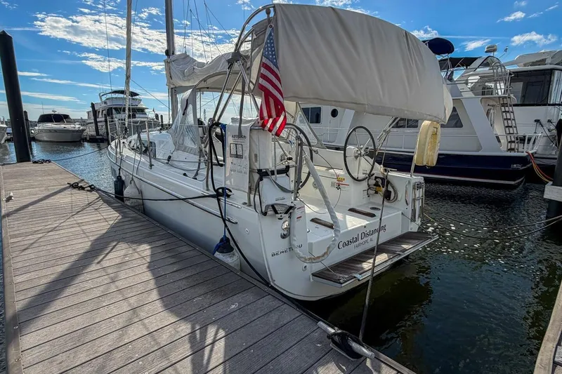 Slide: The Image of Beneteau Oceanis 30.1 sailboat docked at marina, 2021 model, sunny day. - 31