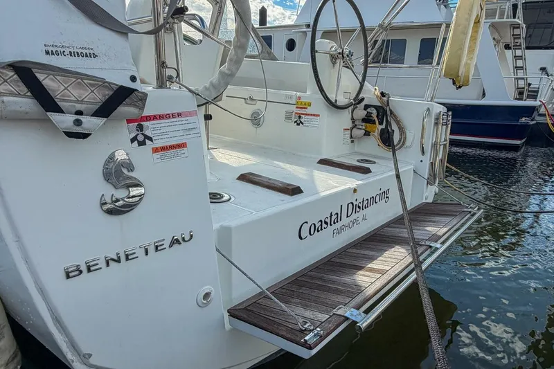 Slide: The Image of 2021 Beneteau Oceanis 30.1 sailboat docked, named "Coastal Distancing," Fairhope, AL. - 34