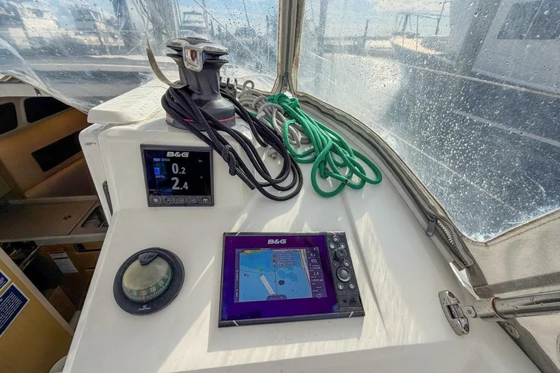 Slide: The Image of Beneteau Oceanis 30.1 cockpit with navigation instruments and ropes, 2021 model. - 47