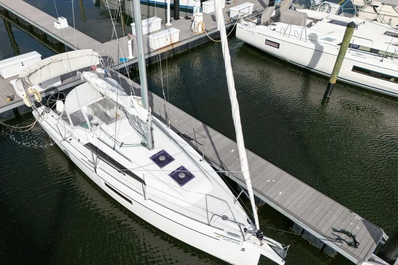 Slide: The Image of 2021 Beneteau Oceanis 30.1 sailboat docked at marina, aerial view. - 62