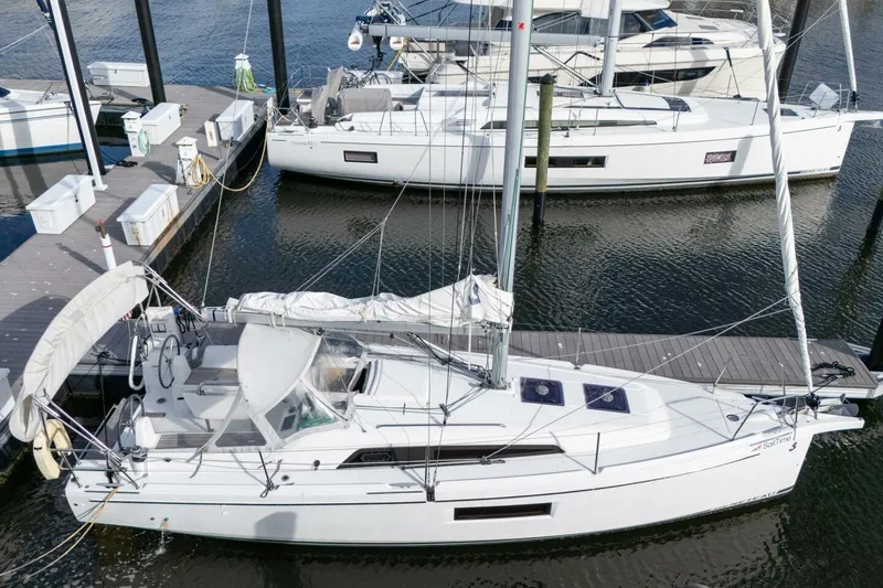 Slide: The Image of 2021 Beneteau Oceanis 30.1 sailboat docked at marina, aerial view. - 65