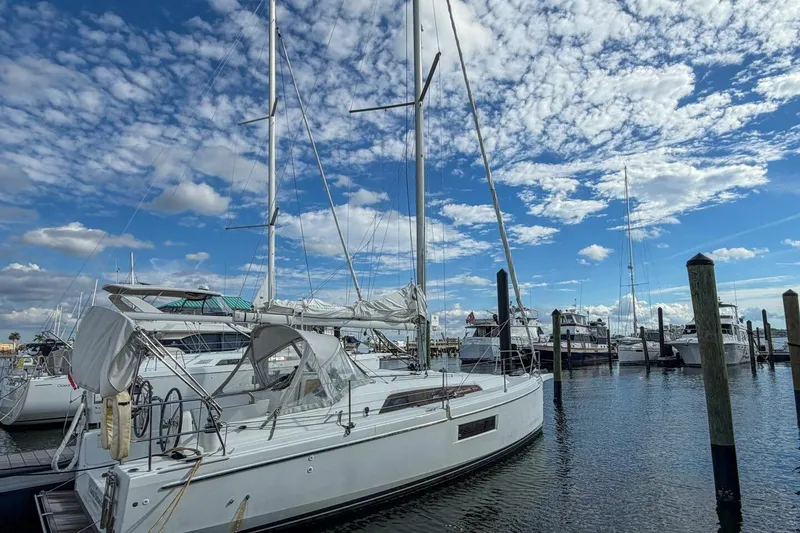 Slide: The Image of Beneteau Oceanis 30.1 sailboat docked at marina under blue sky, 2021 model. - 66
