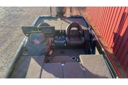 Slide: The Image of 2020 Bass Cat Eyra Premium boat interior with seating and control panel. - 2