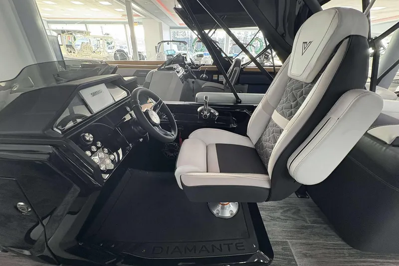 Slide: The Image of Luxurious Viaggio D24U A-T 2026 boat interior with modern steering and plush seating. - 19