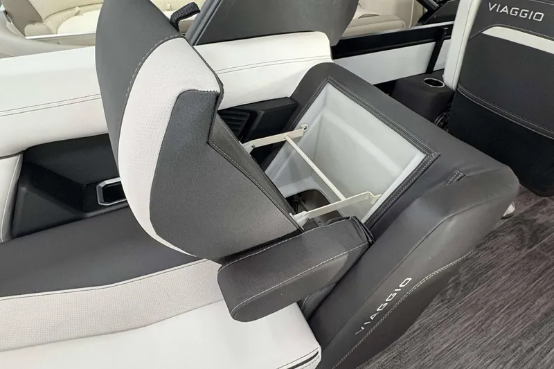 Slide: The Image of Viaggio D24U A-T 2026 interior with open storage compartment in luxury seating. - 24