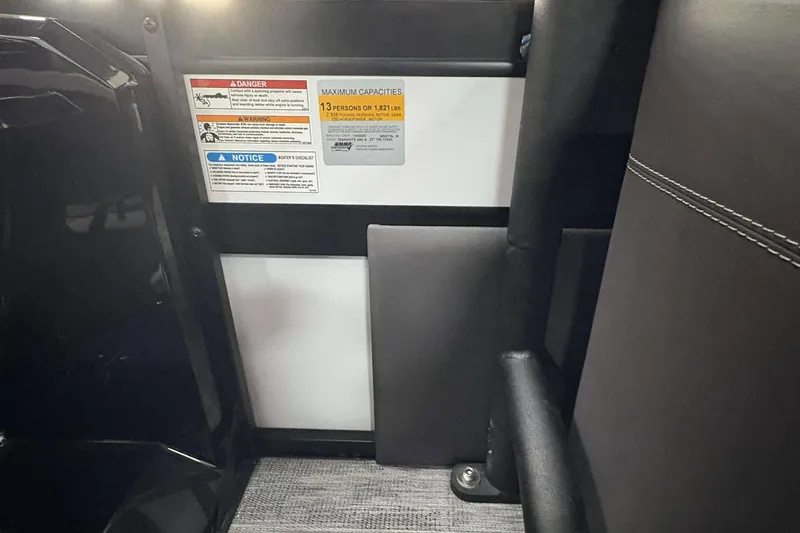 Slide: The Image of Interior of 2026 Viaggio D24U A-T showing safety and capacity labels. - 26