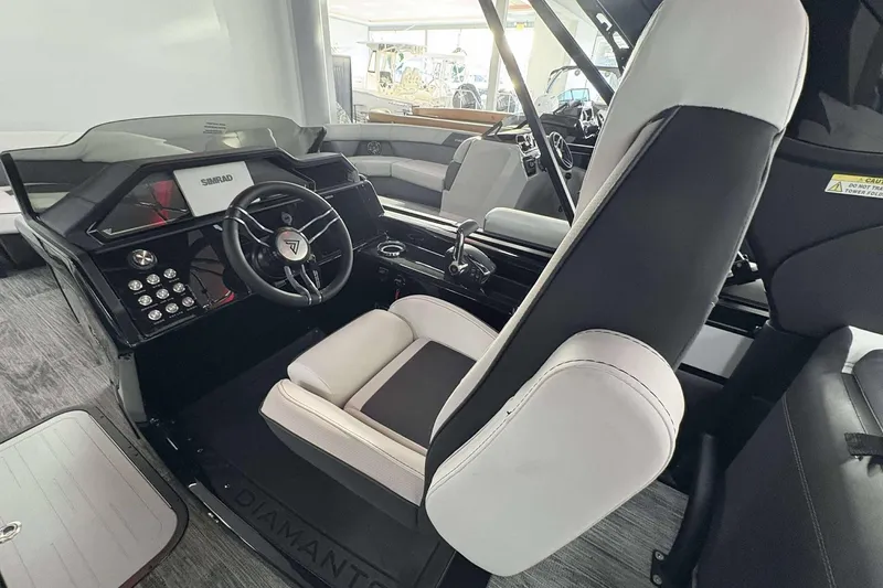 Slide: The Image of Interior of 2026 Viaggio D24U A-T boat with modern steering and seating. - 7