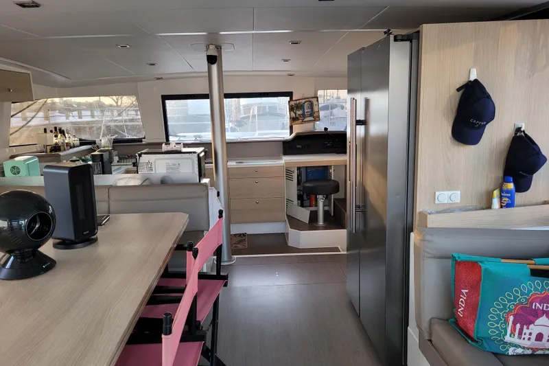 Slide: The Image of Interior of 2019 Bali 4.3 yacht with modern kitchen and seating area. - 16