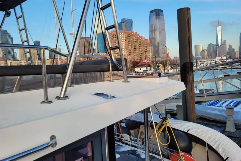 Slide: The Image of Bali 4.3 catamaran docked with city skyline in the background, 2019 model. - 20