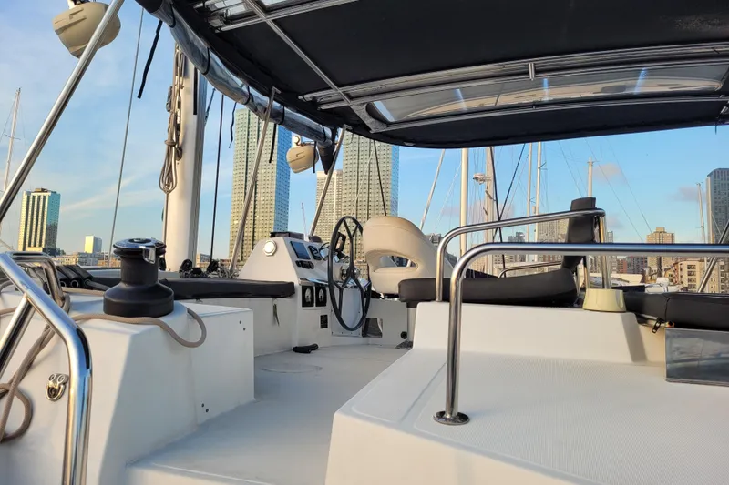 Slide: The Image of Cockpit of 2019 Bali 4.3 catamaran with city skyline in background. - 22