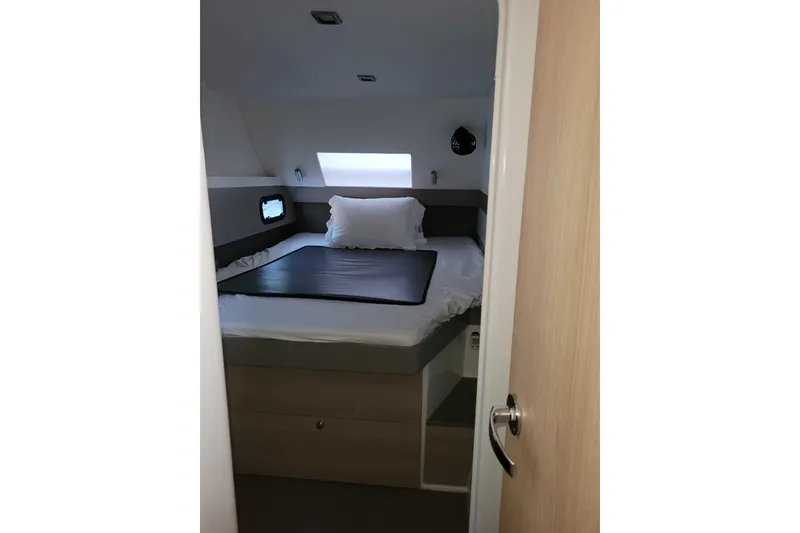 Slide: The Image of Cozy cabin interior of 2019 Bali 4.3 yacht with bed and window. - 36