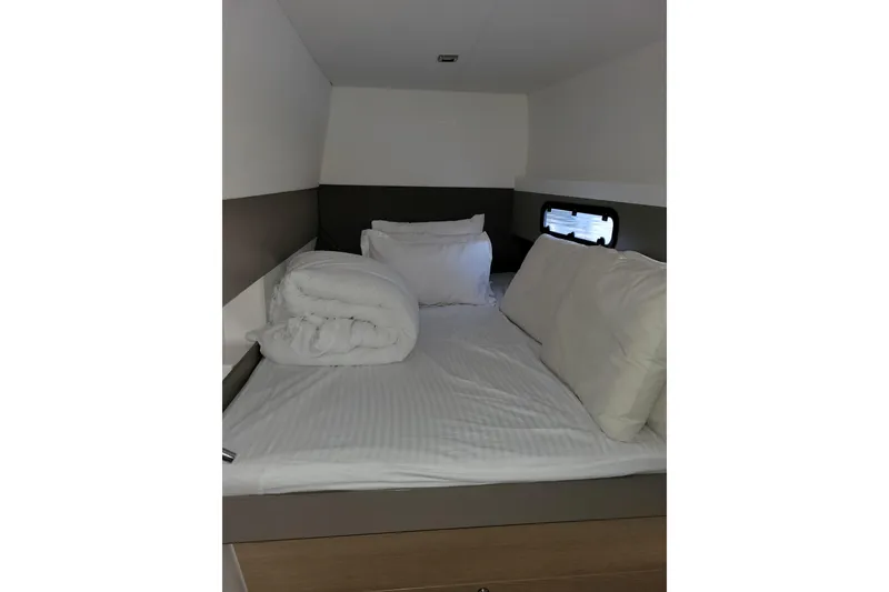 Slide: The Image of Cozy cabin bed in 2019 Bali 4.3 yacht with pillows and bedding. - 38