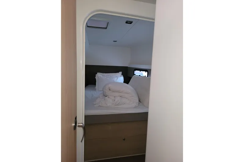 Slide: The Image of Cozy cabin bedroom in 2019 Bali 4.3 yacht with neatly arranged bedding. - 39