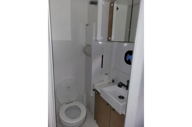 Slide: The Image of Compact bathroom in 2019 Bali 4.3 model yacht with toilet, sink, and storage. - 42