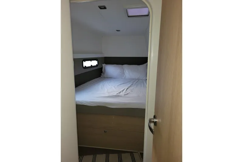 Slide: The Image of Cozy cabin bedroom in 2019 Bali 4.3 yacht with window and bedding. - 44