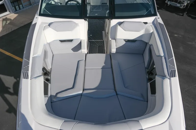 Slide: The Image of 2026 MasterCraft XStar 25 boat interior with luxurious seating and modern design. - 11