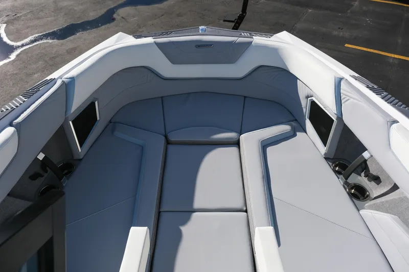 Slide: The Image of 2026 MasterCraft XStar 25 boat interior with luxurious seating and modern design. - 15