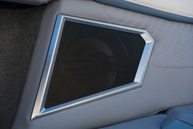 Slide: The Image of Speaker detail in 2026 MasterCraft XStar 25 boat interior, featuring sleek design and stitching. - 17